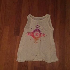 tan tank top with geometric shape